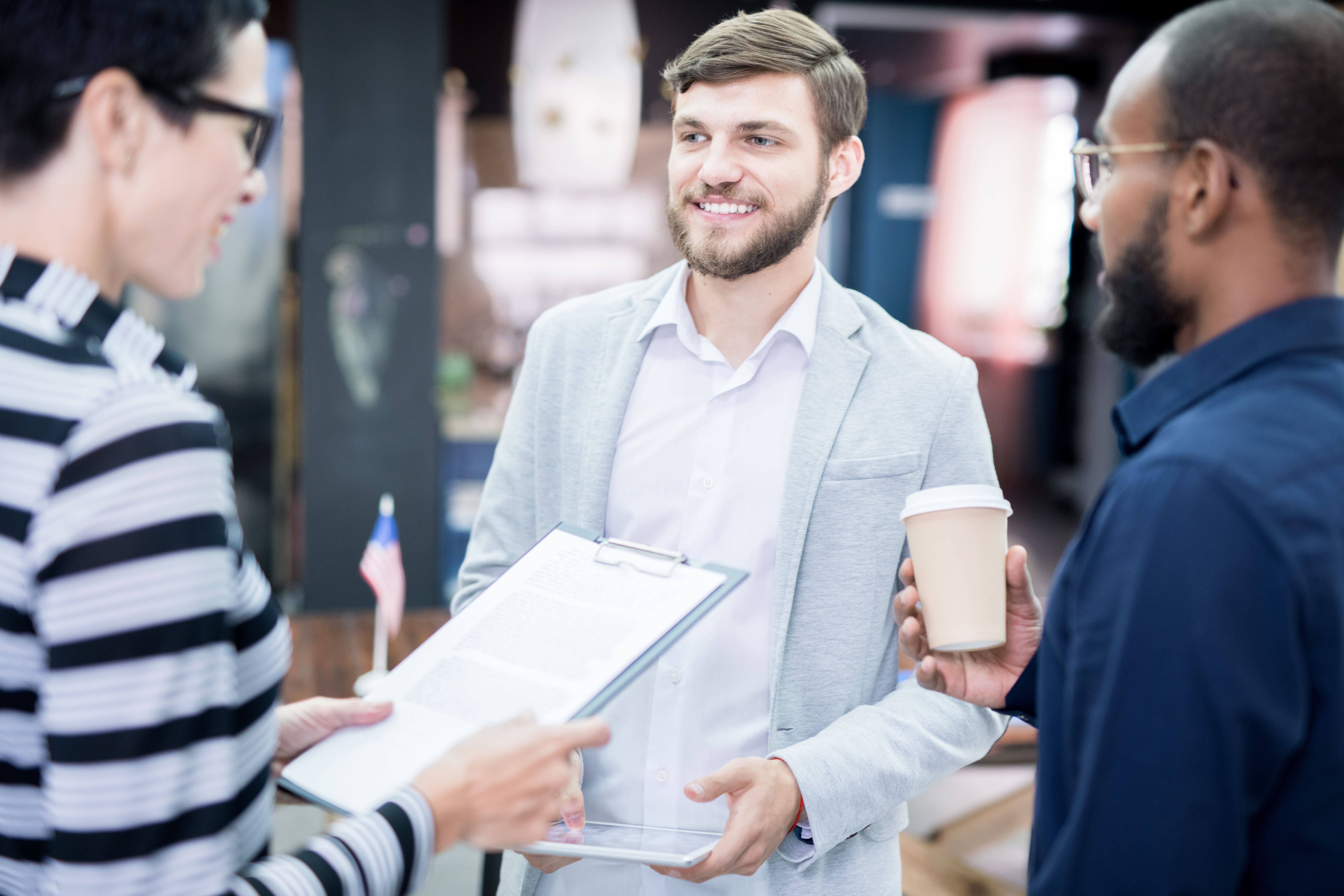 A professional field marketing team speaking with potential customers