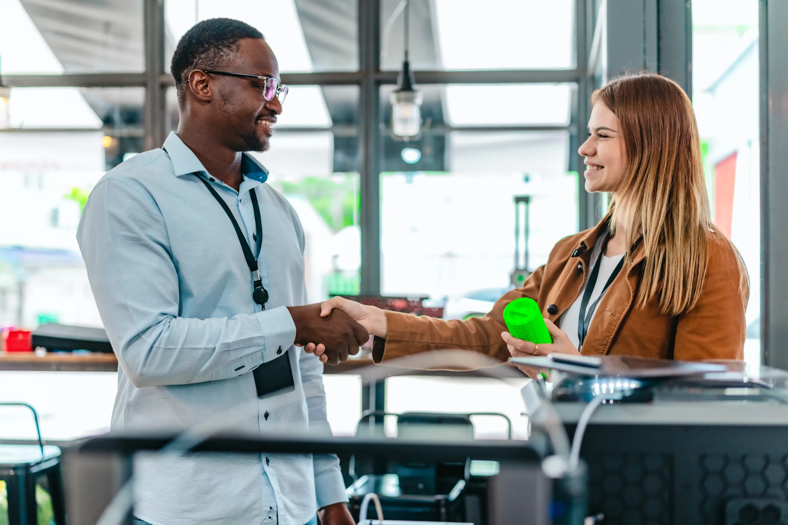 A professional field sales representative speaking with a customer